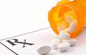 A close up of pills on top of a table